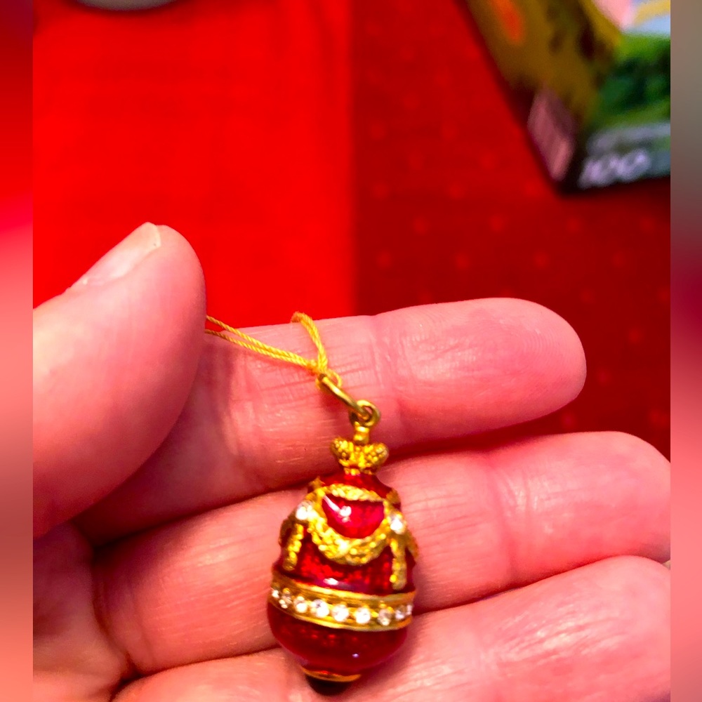 Faberge Silver 925 egg. In Ruby Red Enamel with clear rhinestones and amber 1 to